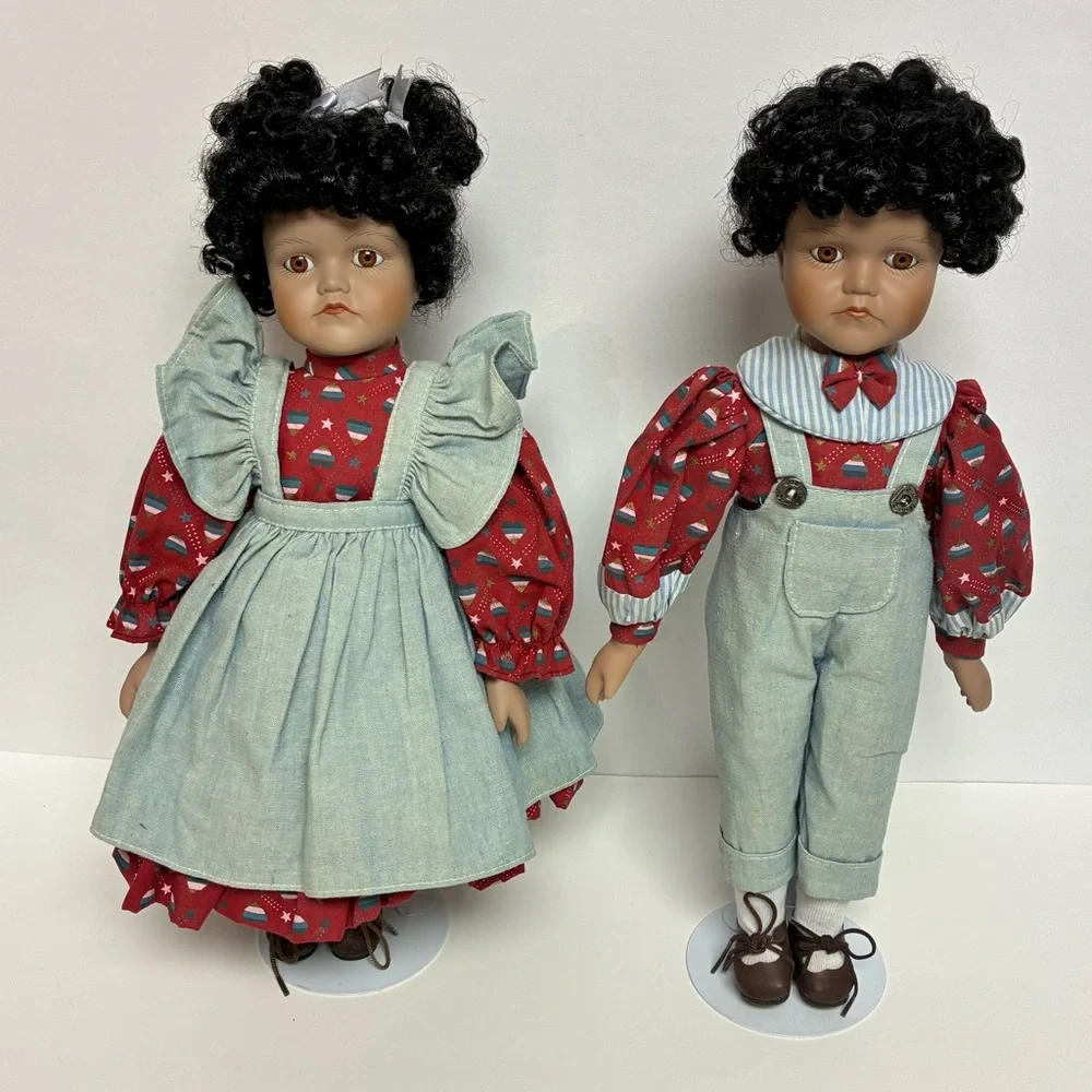 Delton Product Corp. Porcelain Brown Boy Girl Dolls Stands Matching Outfits